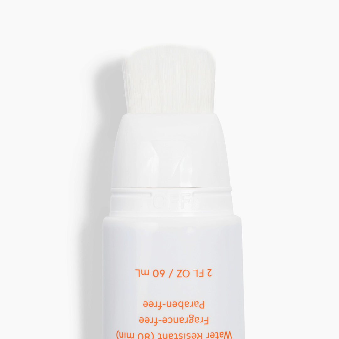 Paint-on sun protection for independent kids - Squeen - The Track and Field Store