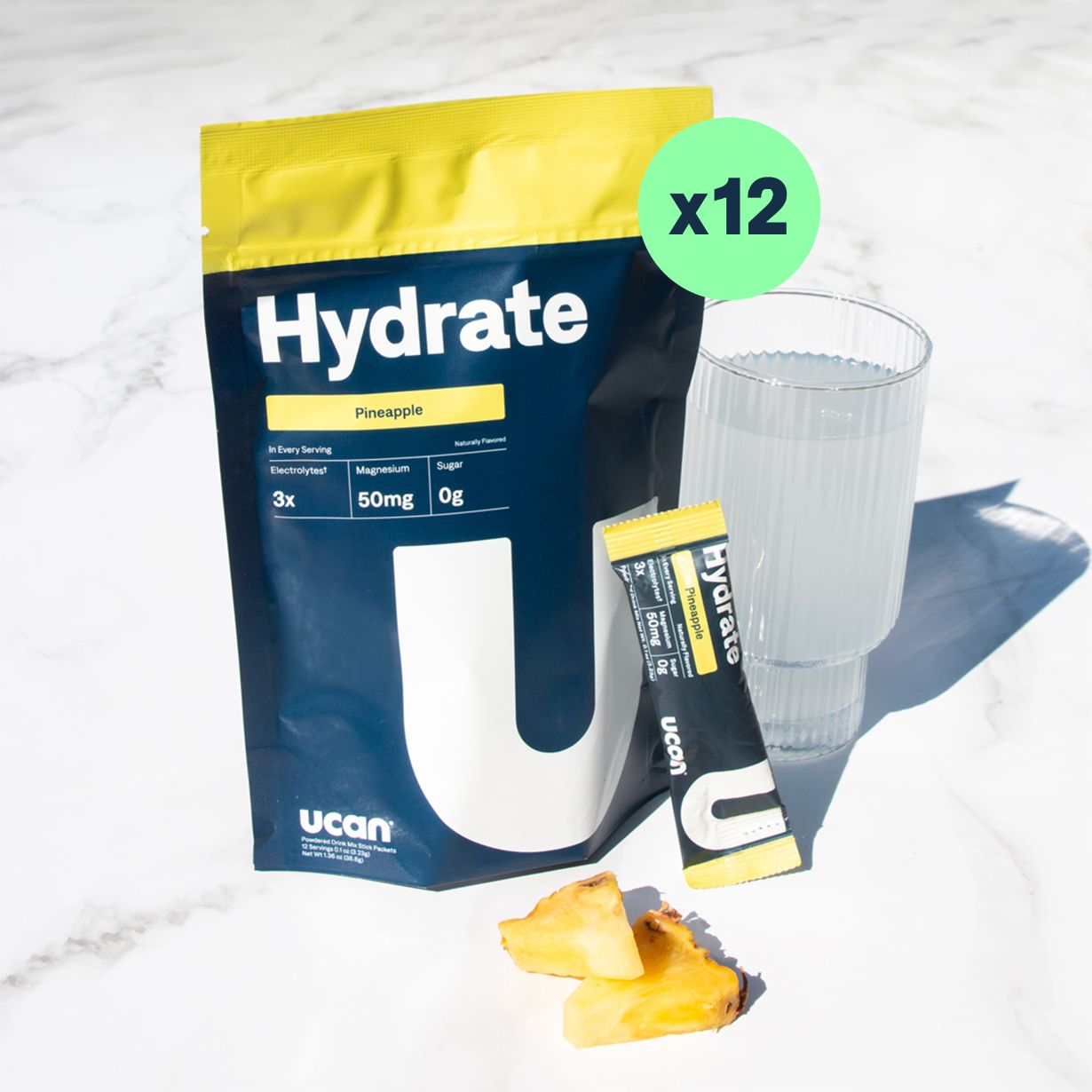 Pineapple Hydrate Electrolyte Packets - UCAN - The Track and Field Store